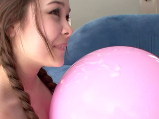 Pigtailed teen Mika Sparx gives a blowjob